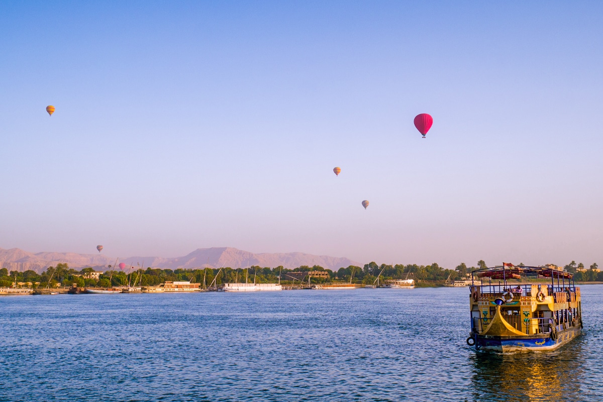 Nile cruise sailing from Luxor toward Aswan Egypt